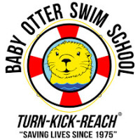 Baby otter swim school